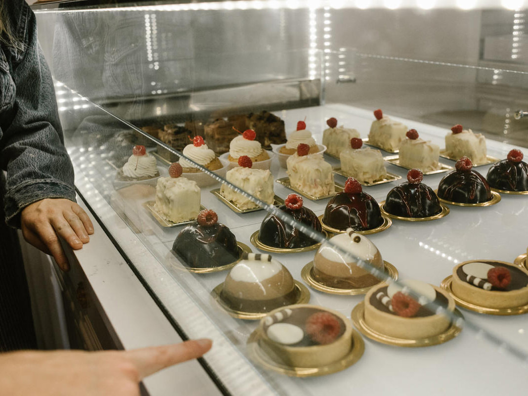 Desserts in a display case at a pastry shop